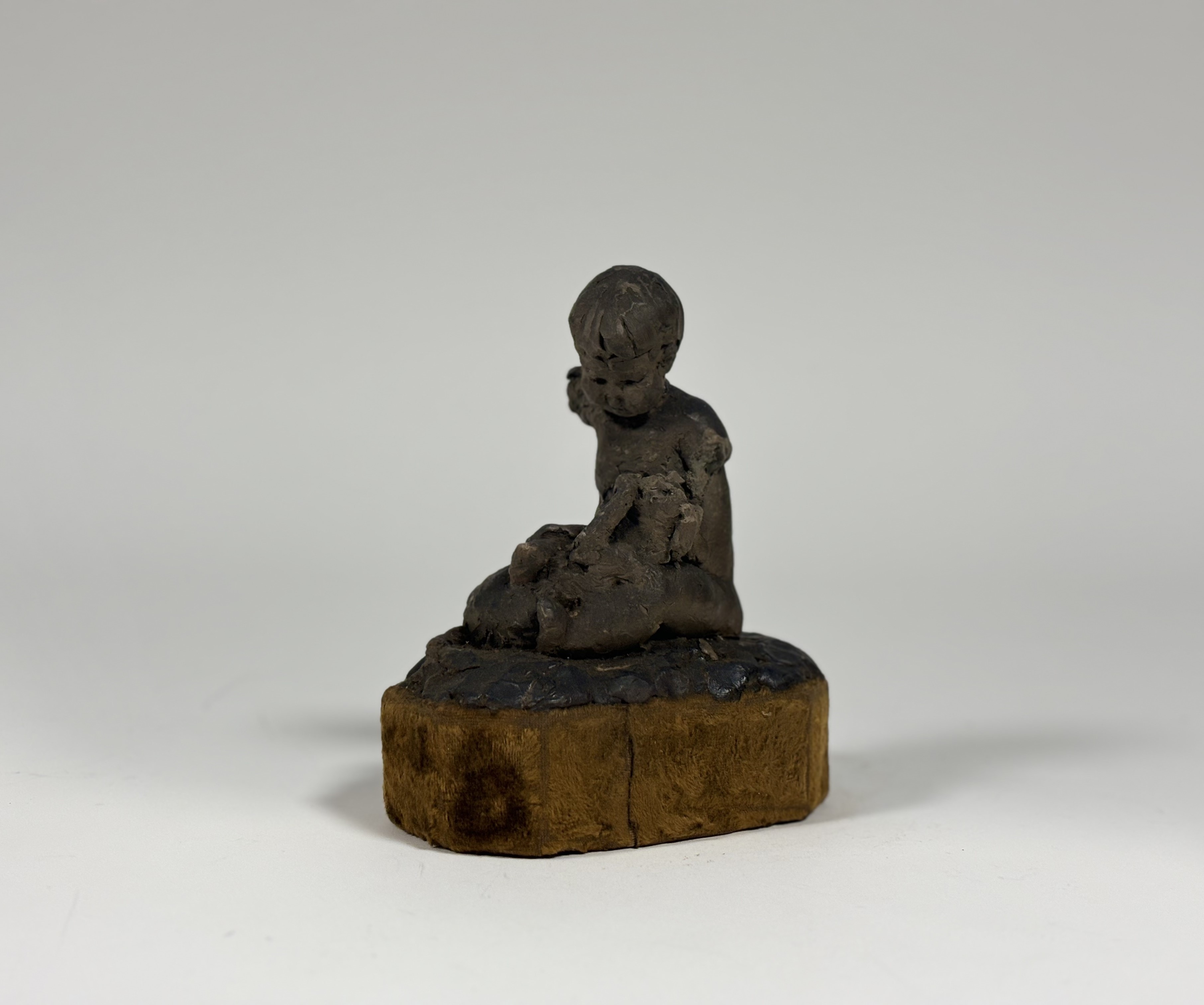 Attributed to Sophia Rosamond Praeger M.B.E. (Irish, 1867-1954), a wax maquette of a Child with a