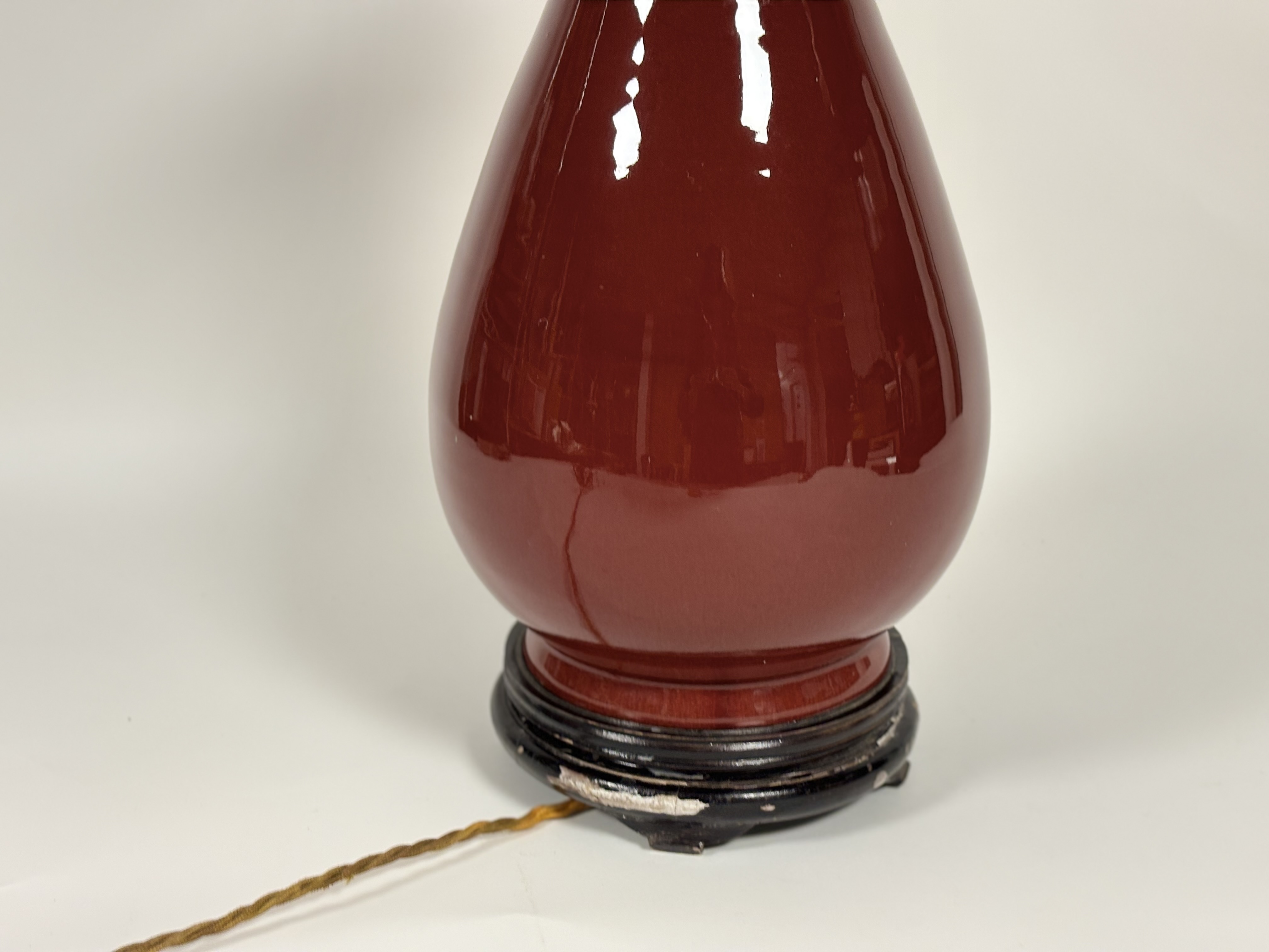 A Chinese porcelain vase in an oxblood glaze, of baluster form, mounted as a table lamp, on an - Image 3 of 5