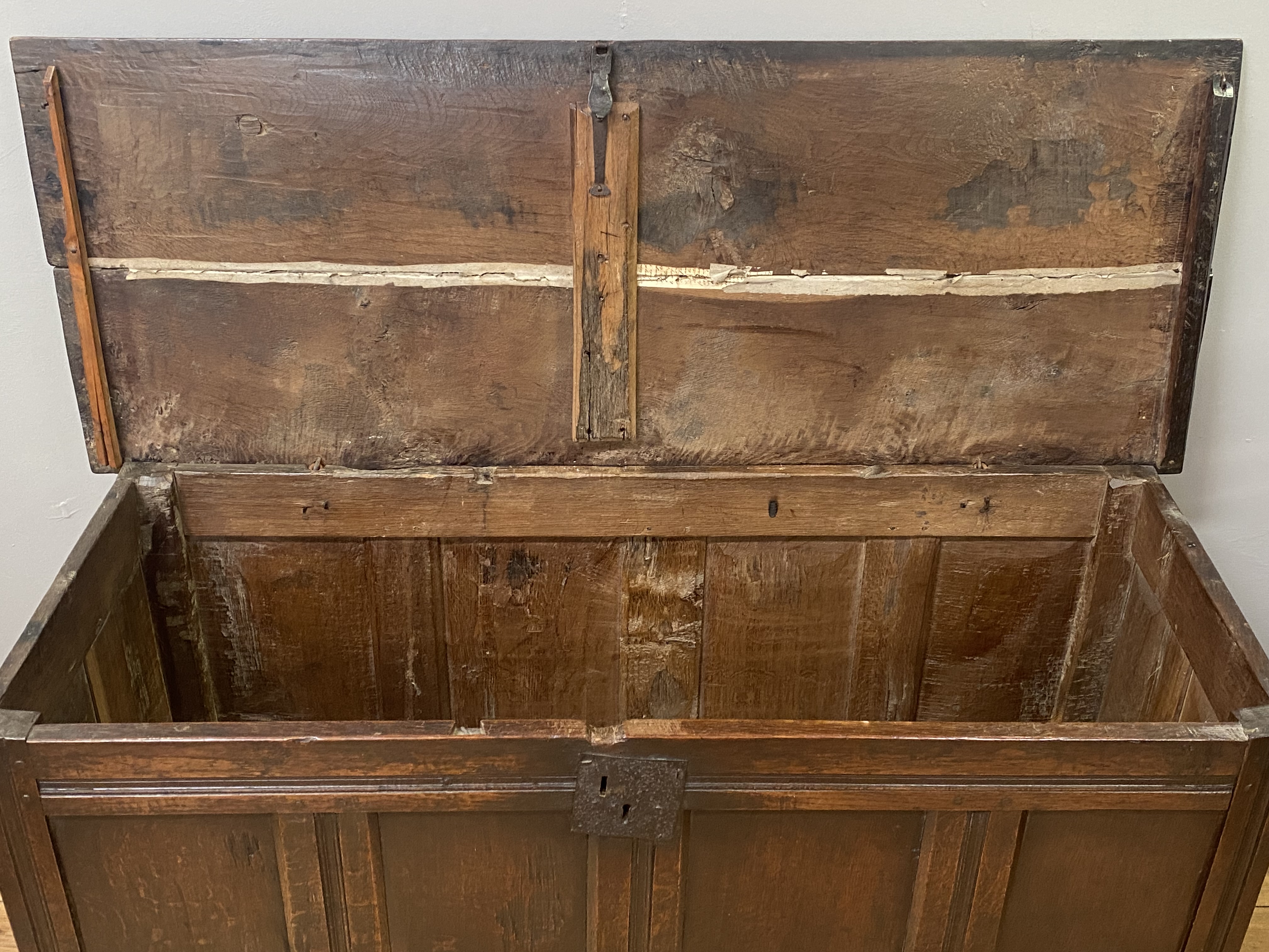 An English oak coffer of pegged and jointed construction, 17th century, the hinged lid opening on - Image 2 of 2