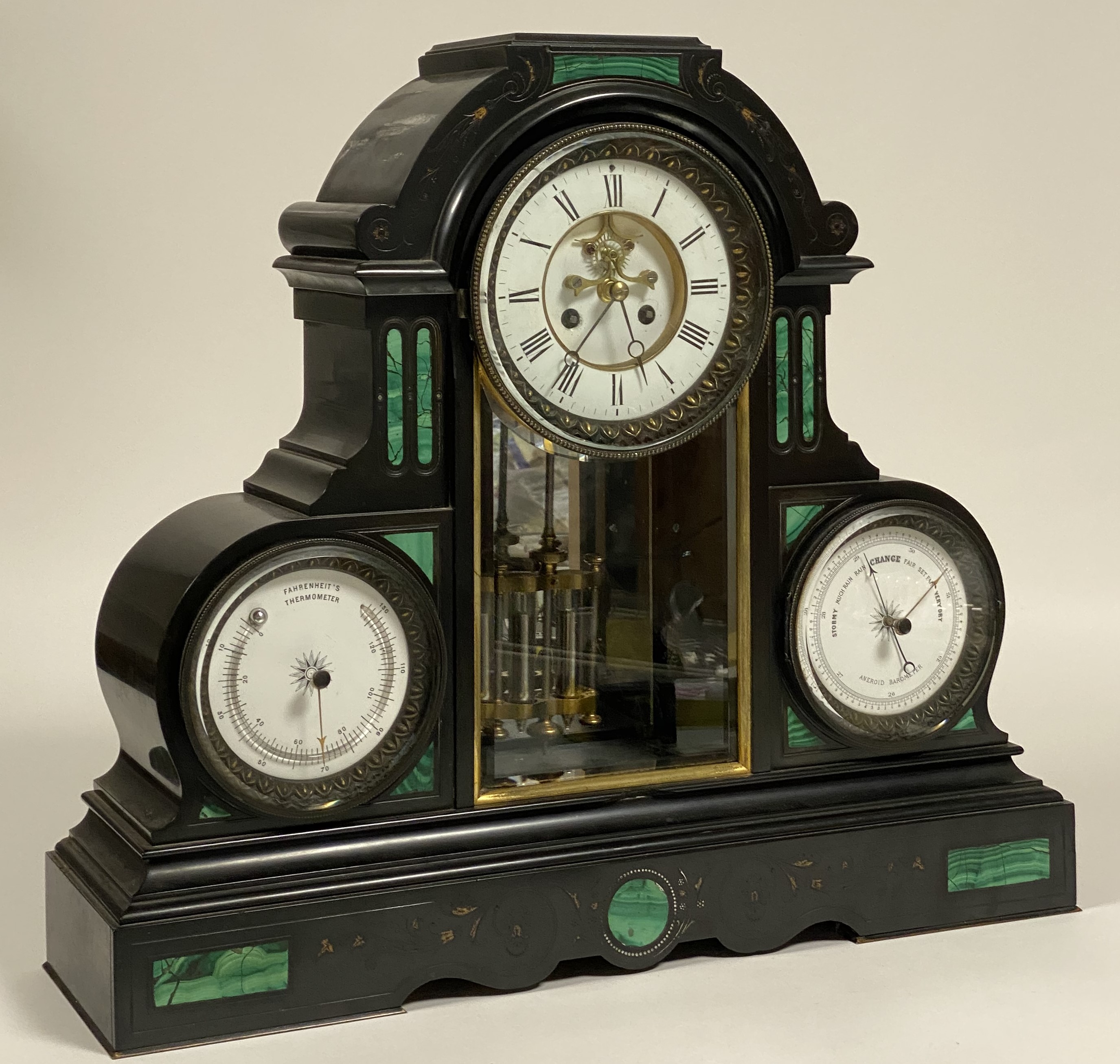 A 19th century slate mantel clock, the case, of architectural form, with incised gilt floral
