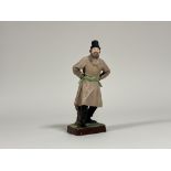 Gardener Porcelain Factory of Moscow, a coloured biscuit porcelain figure of a dancing peasant in