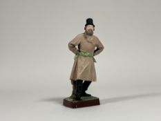 Gardener Porcelain Factory of Moscow, a coloured biscuit porcelain figure of a dancing peasant in