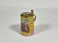 A late 19th century gilt-metal mounted Vienna porcelain tankard and cover, of cylindrical form, with