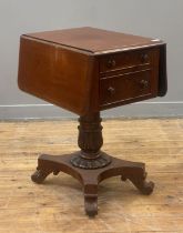 A William IV mahogany sewing table, the top with drop leaf to each side, above two drawers opposed