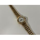 A vintage lady's 9ct gold Rolex wristwatch, the dial with Arabic numerals signed "Rolex /