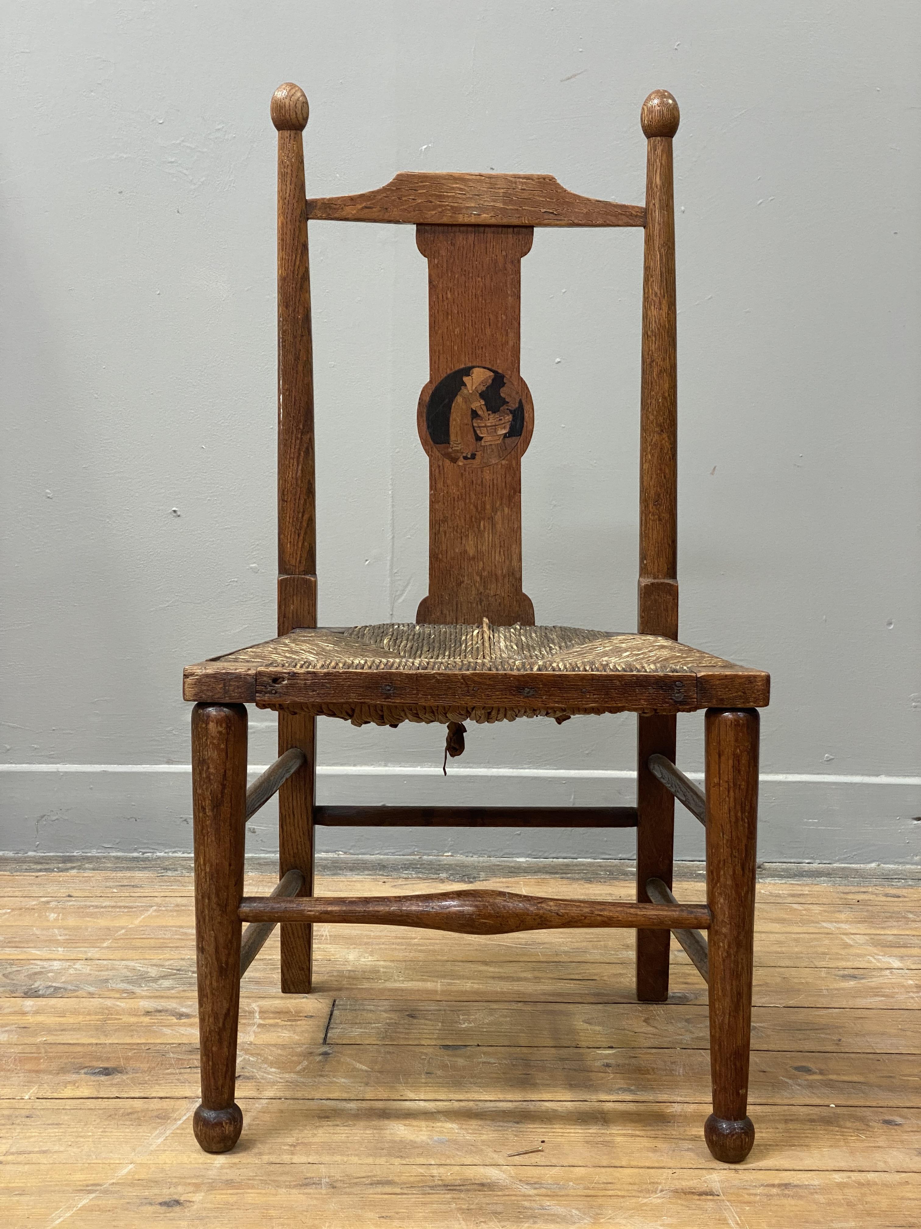Liberty & Co, an Arts and Crafts period oak 'Nursery-Rhyme' chair, the back splat with pictorial - Image 2 of 2