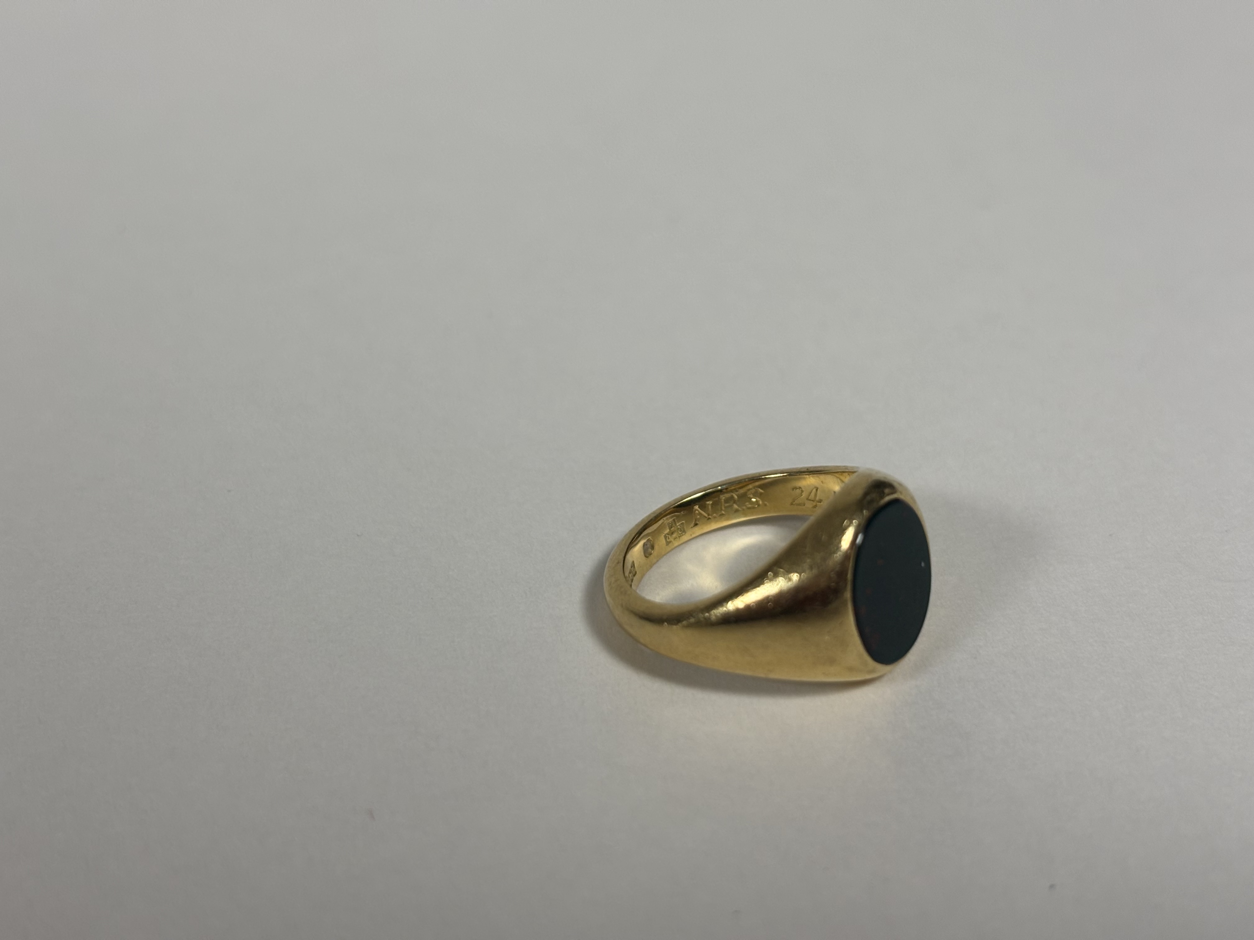 An 18ct gold signet ring, inset with an oval bloodstone plaque; together with a 9ct gold signet - Image 3 of 4