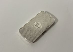 A George V silver card case, William Neale, Birmingham 1911, of rectangular form, with engine-turned