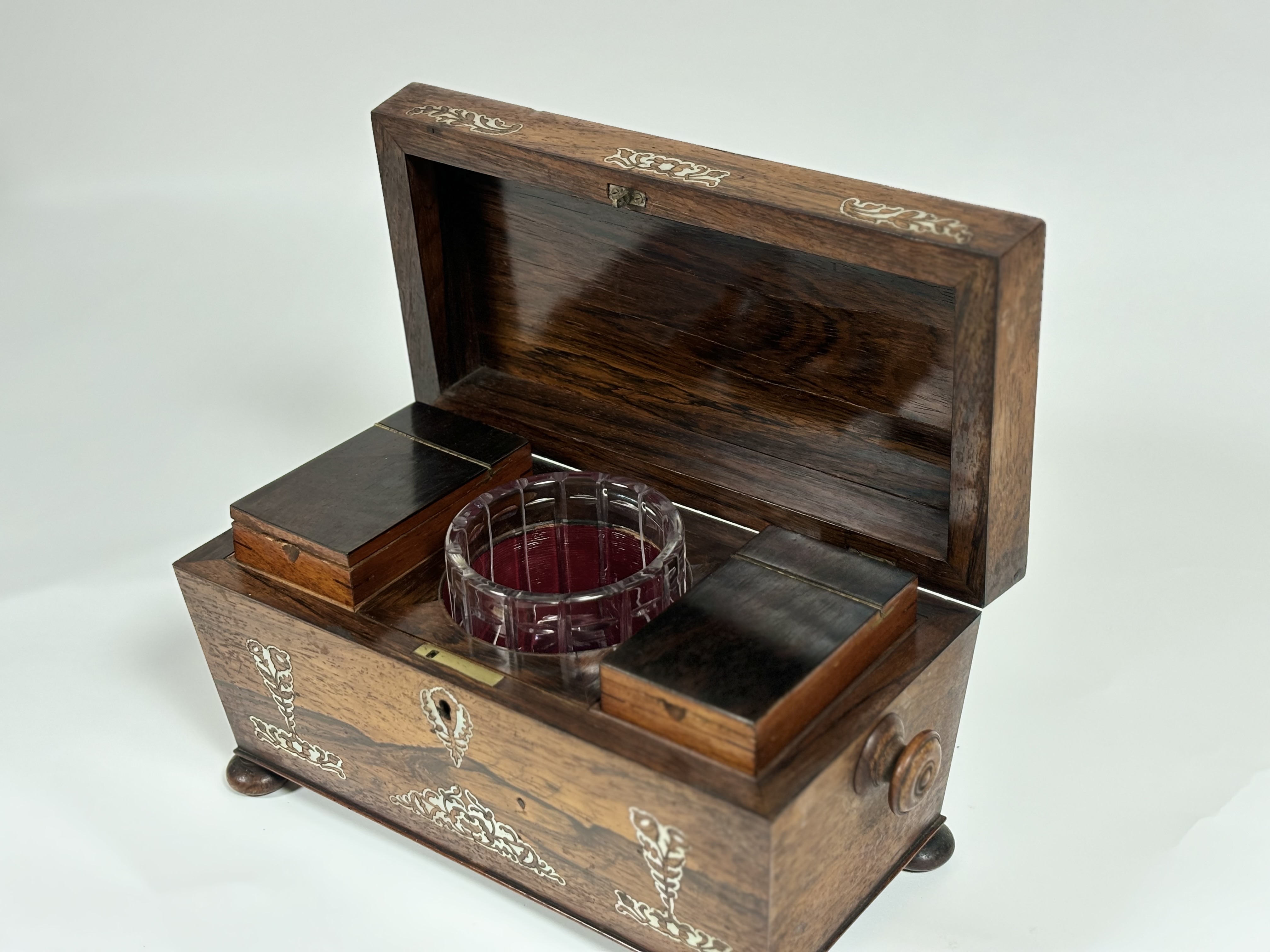 A William IV mother-of-pearl inlaid rosewood tea caddy, of sarcophagus shape, with turned handles - Image 5 of 8