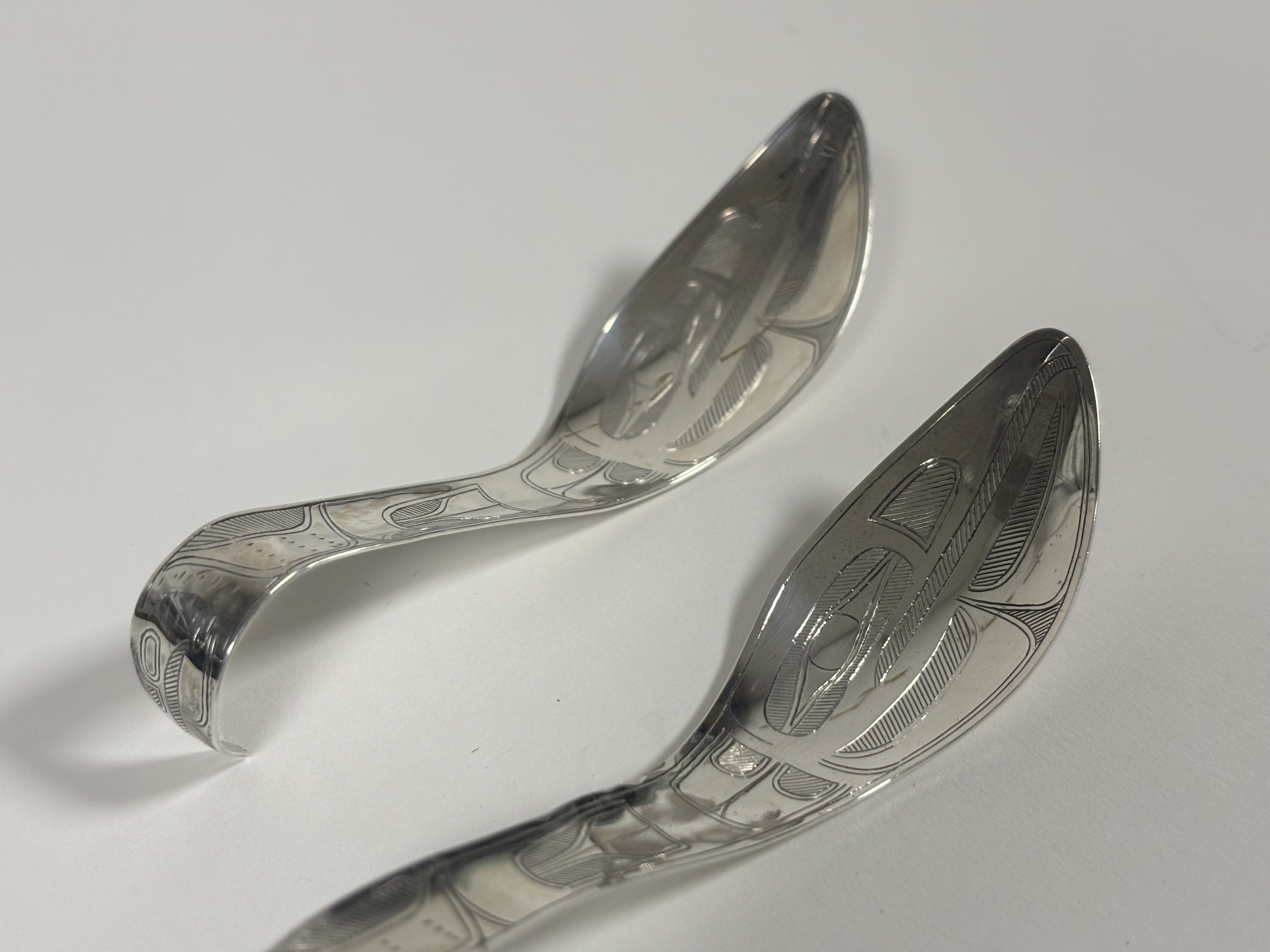 An unusual cased pair of George V silver serving spoons, Robert Tennant & Co., Glasgow 1913, the - Image 3 of 6