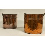 A near pair of 19th century copper log buckets of riveted construction, each with a brass swing