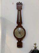 A Victorian Gothic revival barometer and thermometer in an oak banjo pattern case, the silvered