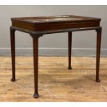 An early 20th century mahogany silver table in the Georgian style, possibly by Warings (Waring &