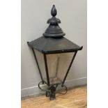 A Victorian style street lantern of characteristic tapered form, black painted copper, with circular