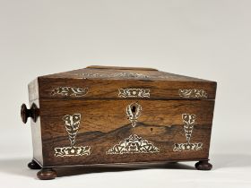 A William IV mother-of-pearl inlaid rosewood tea caddy, of sarcophagus shape, with turned handles