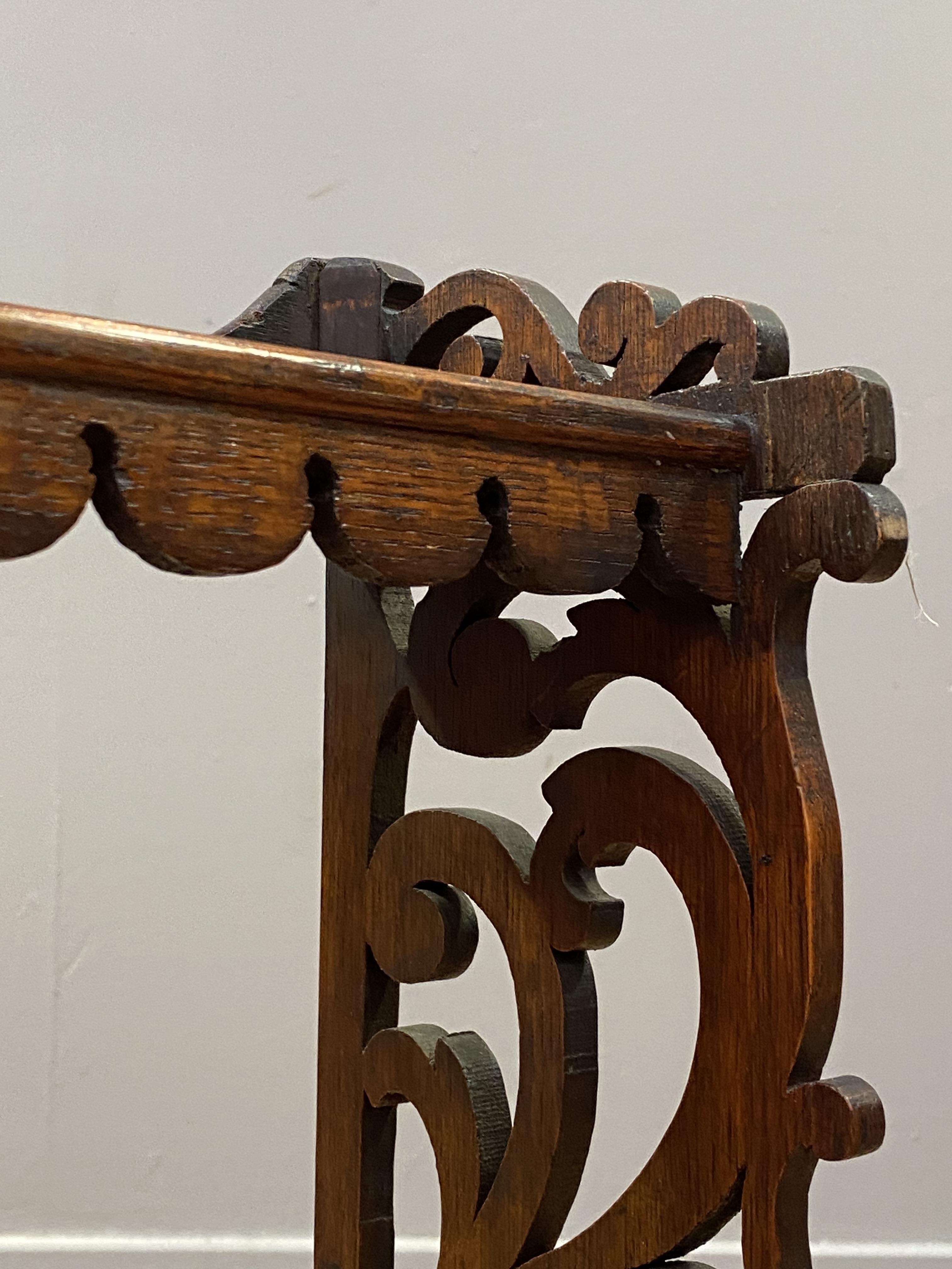 A Victorian oak three height table or wall rack, each shelf with a shaped and carved apron, with - Image 2 of 2