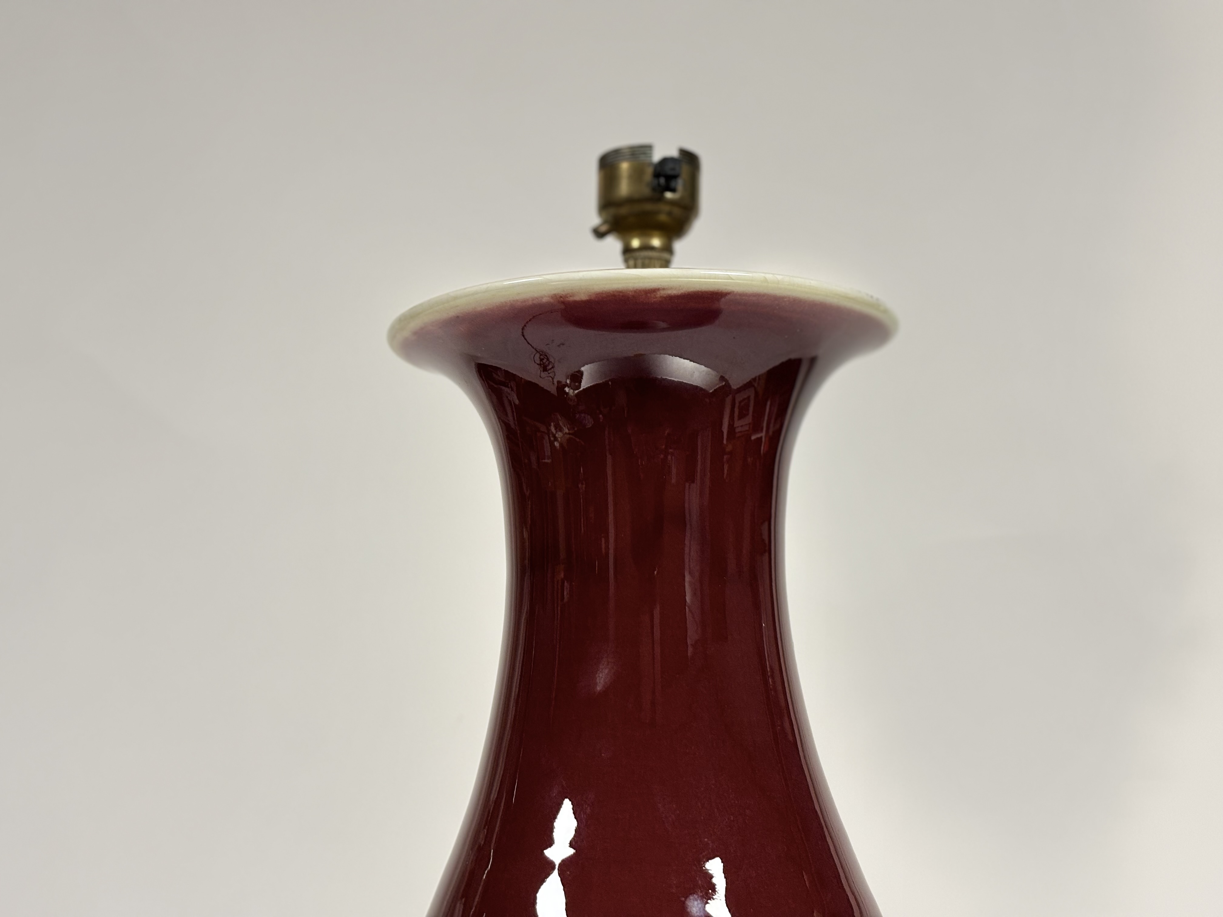 A Chinese porcelain vase in an oxblood glaze, of baluster form, mounted as a table lamp, on an - Image 2 of 5
