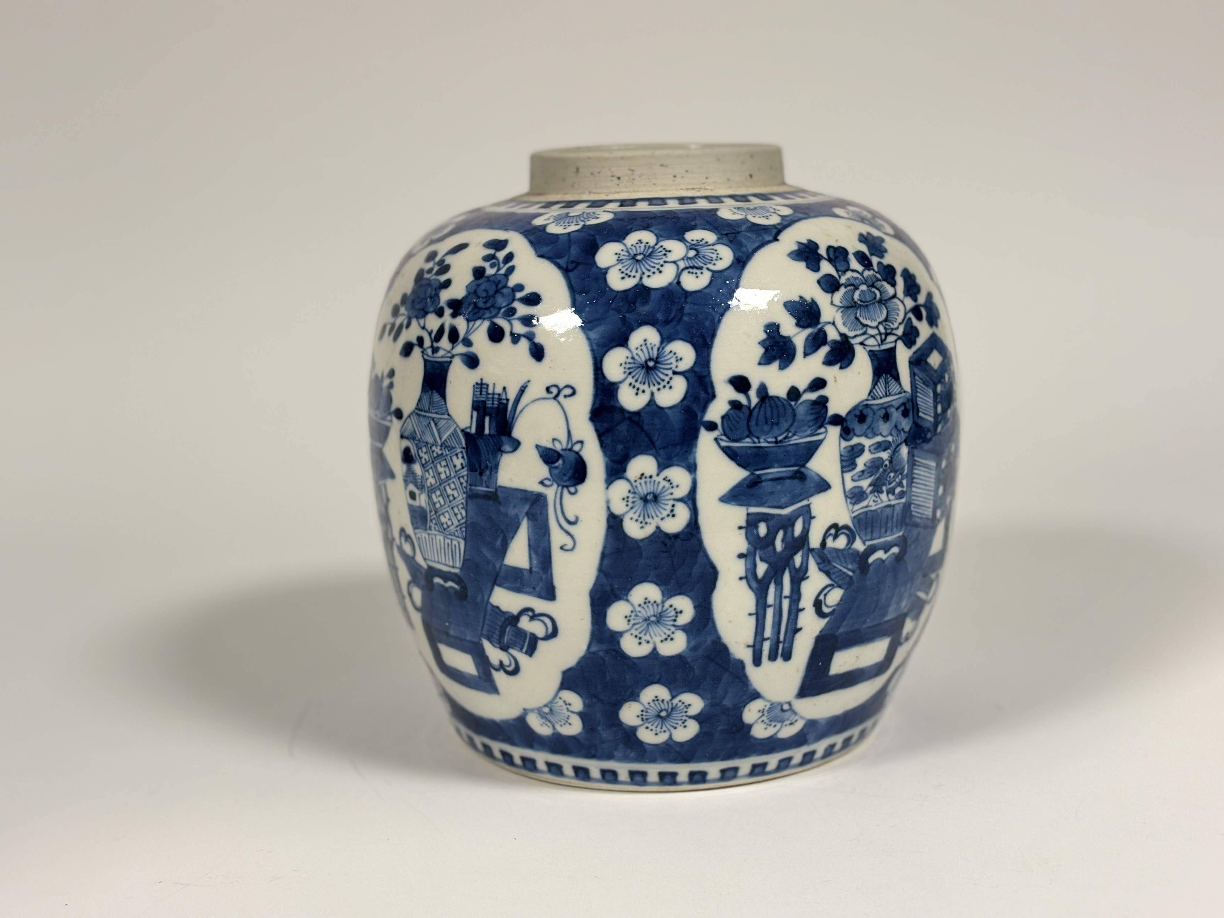 A Chinese blue and white porcelain ovoid jar, probably Kangxi period, painted with shaped cartouches - Image 4 of 6