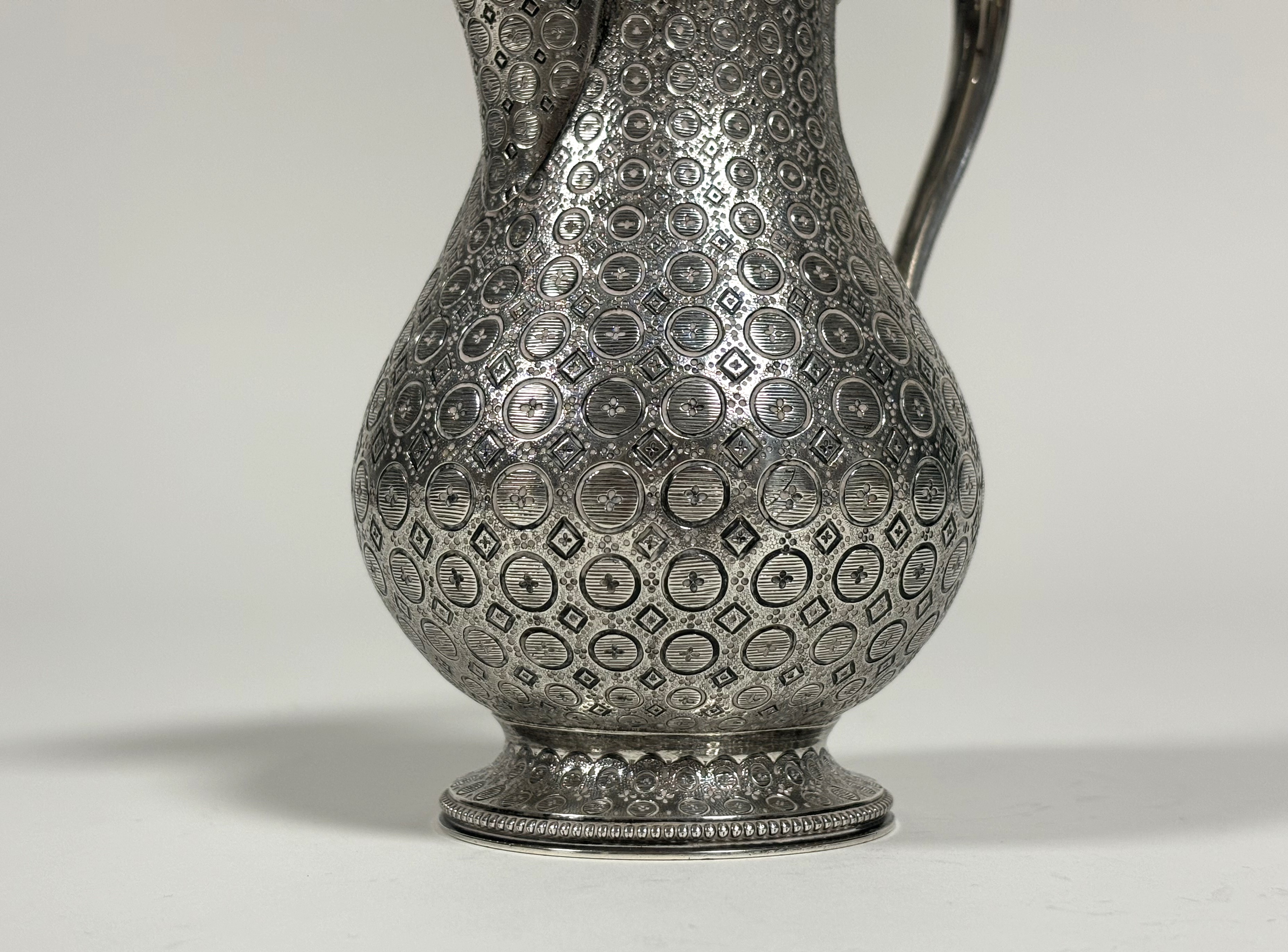 A mid-Victorian silver baluster cream jug, Edward & John Barnard, London 1863, densely engraved with - Image 3 of 5