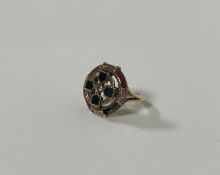 A Scottish hardstone-inset ring, modelled with a Celtic Cross within a circular band, in unmarked