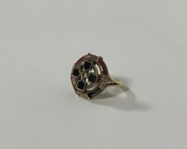 A Scottish hardstone-inset ring, modelled with a Celtic Cross within a circular band, in unmarked