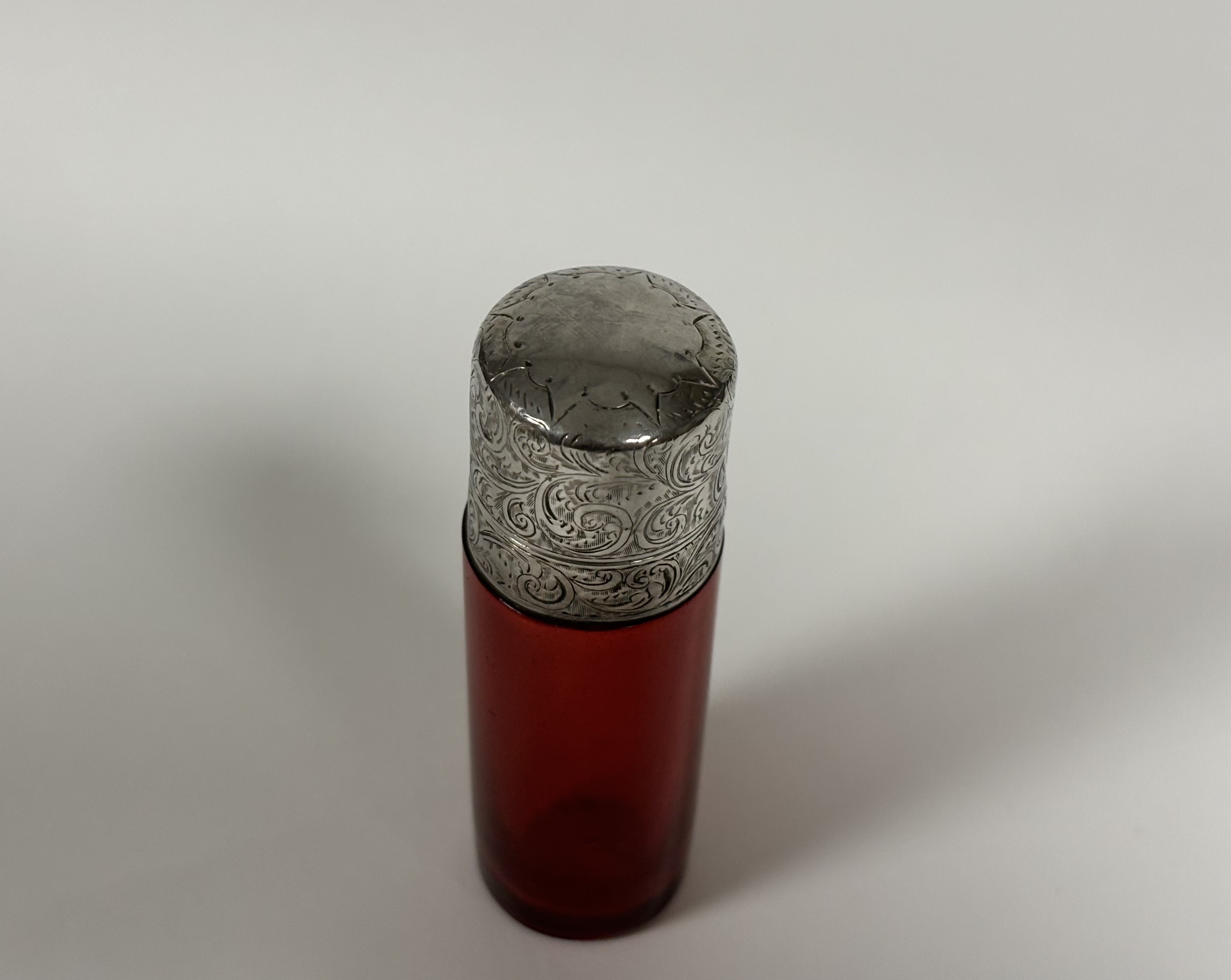 Two late 19th century ruby glass scent bottles: the first double-ended in faceted glass with - Image 3 of 10