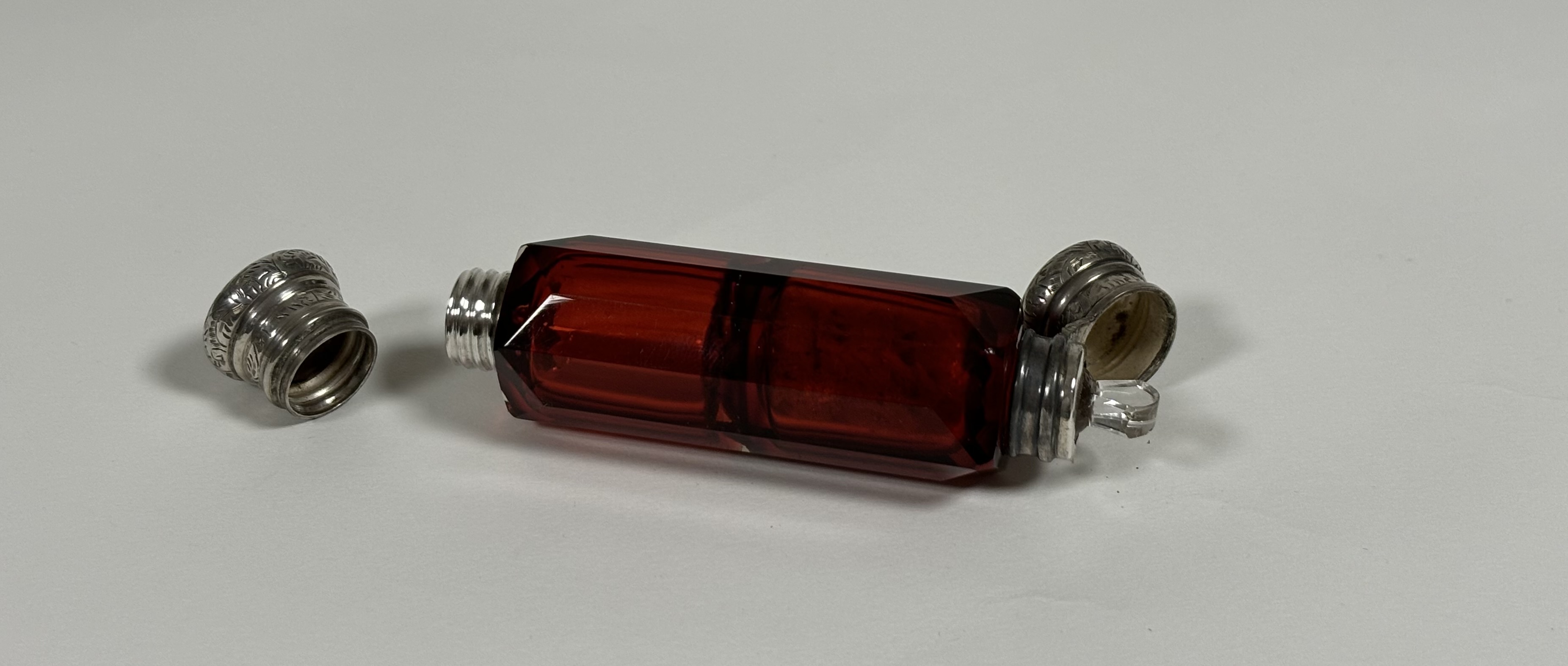 Two late 19th century ruby glass scent bottles: the first double-ended in faceted glass with - Image 8 of 10