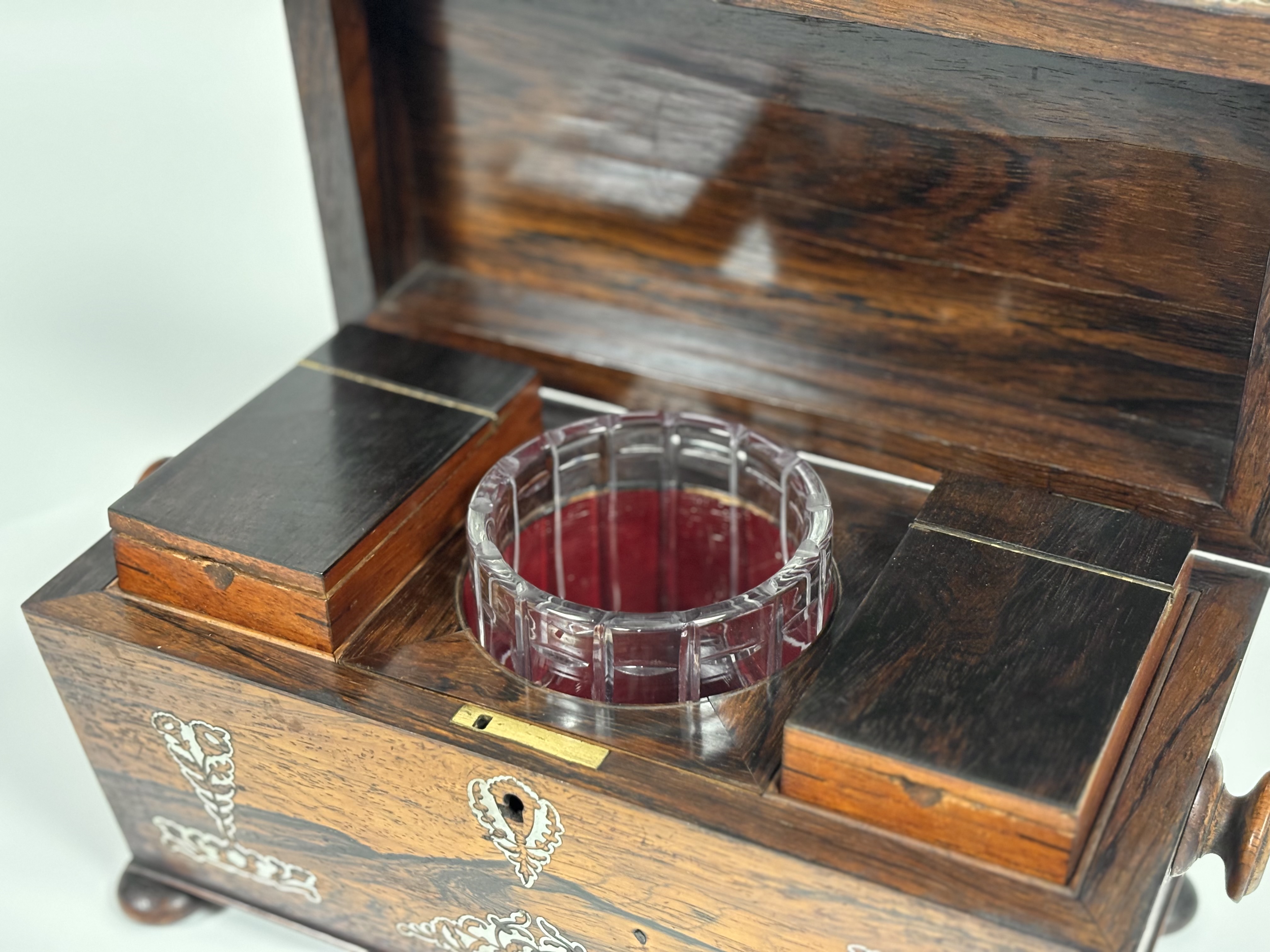 A William IV mother-of-pearl inlaid rosewood tea caddy, of sarcophagus shape, with turned handles - Image 6 of 8