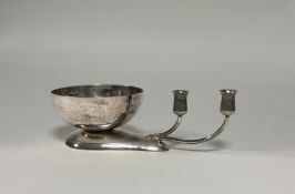 A modernist silver table centrepiece, maker's mark PDB, London 1978, formed of a planished bowl on a