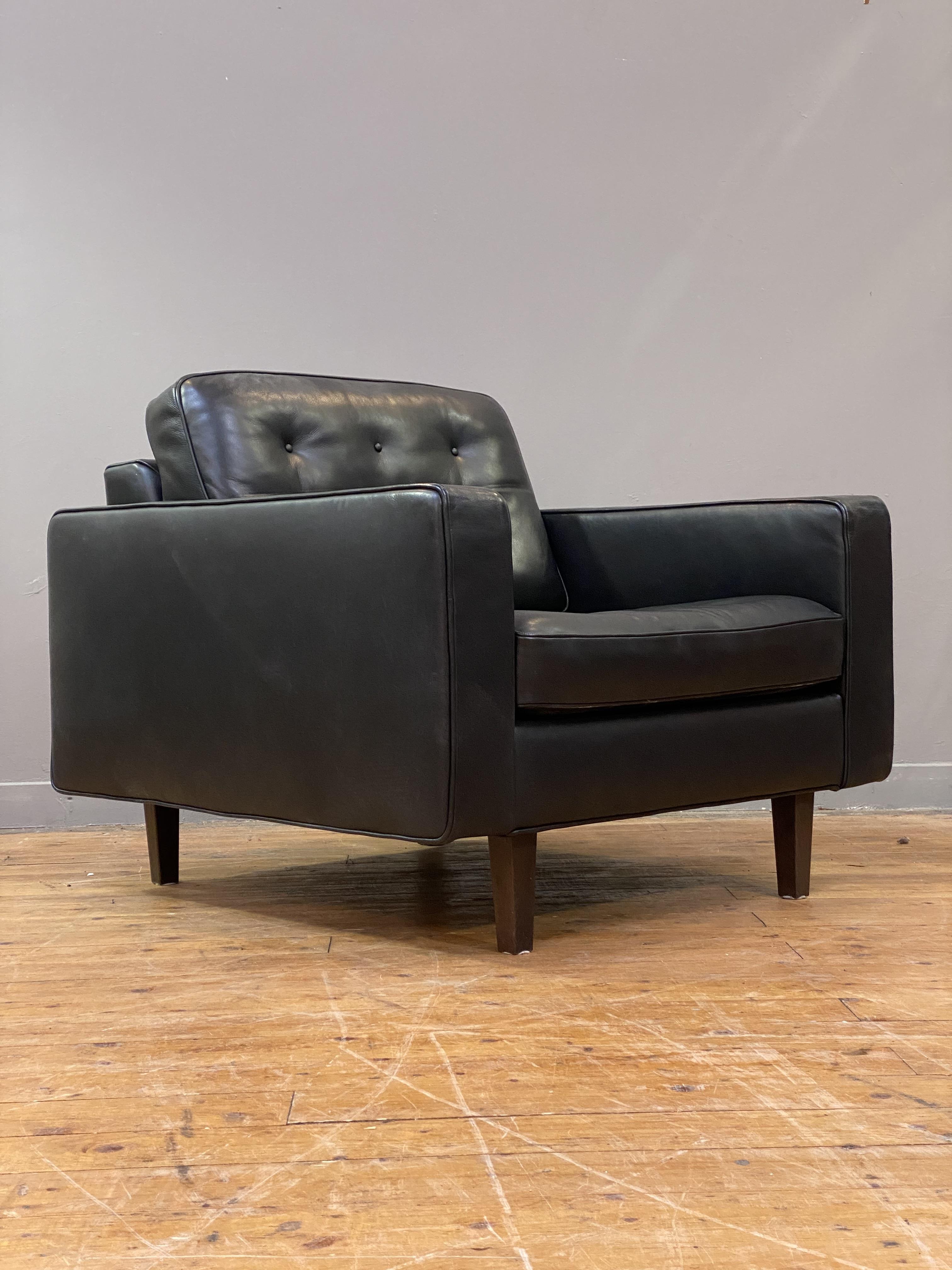 Heals, a pair of lounge chairs, upholstered in buttoned semi-aniline black leather and standing on - Image 2 of 2