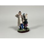 Gardener Porcelain Factory of Moscow, a coloured biscuit porcelain group of a drunken peasant with