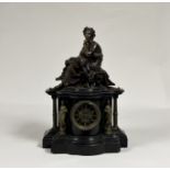 A French patinated and gilt bronze mounted slate mantel clock, late 19th century, the well-cast