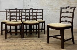 A set of six George III mahogany ribbon back dining chairs, of characteristic form, with drop in