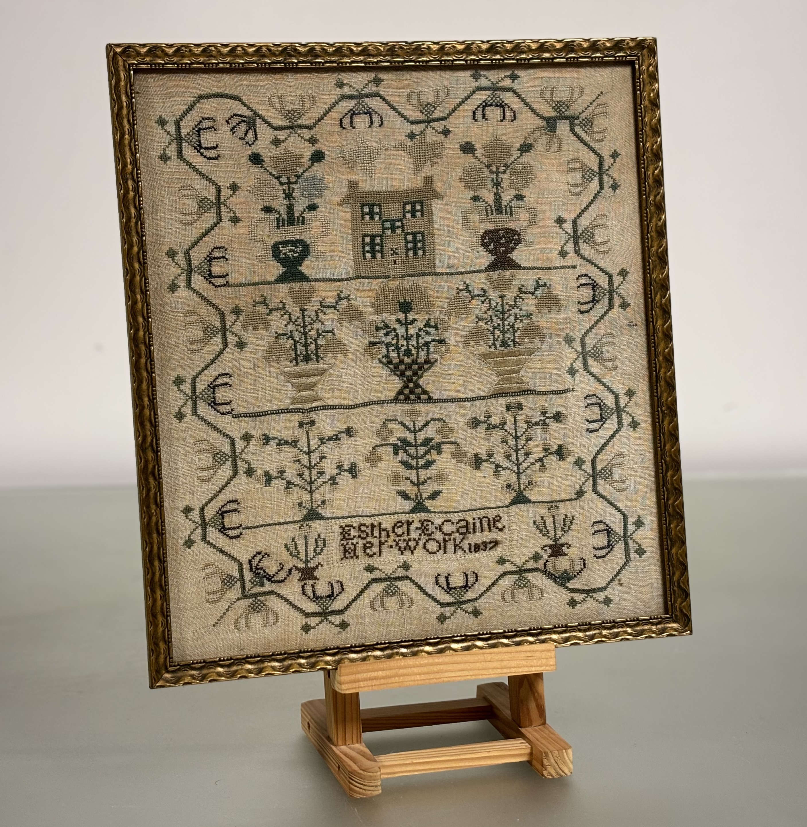 An early Victorian needlework sampler, Esther Caine, Her Work, 1837, worked in polychrome threads