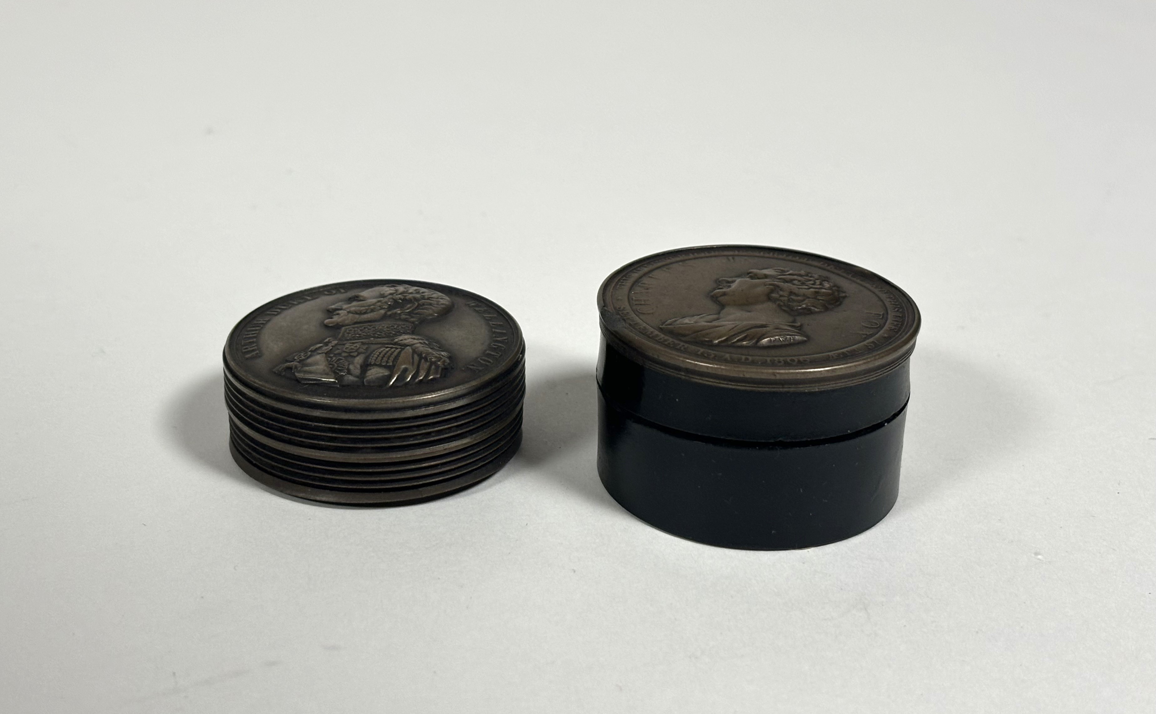 Two 19th century commemorative snuff boxes: a bronzed spelter circular example based on the design - Image 2 of 3