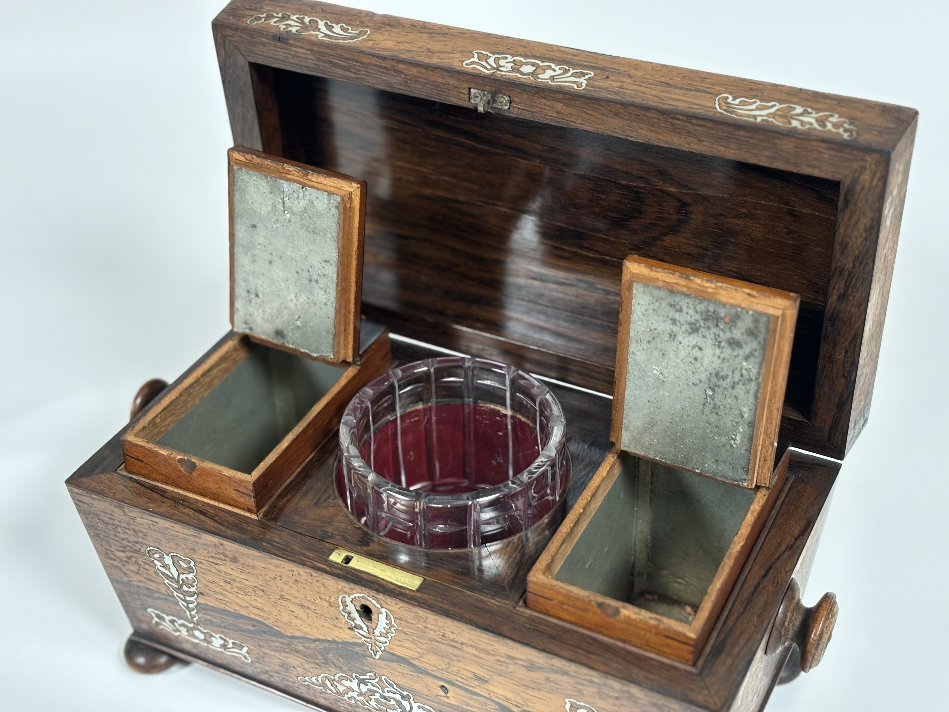 A William IV mother-of-pearl inlaid rosewood tea caddy, of sarcophagus shape, with turned handles - Image 7 of 8