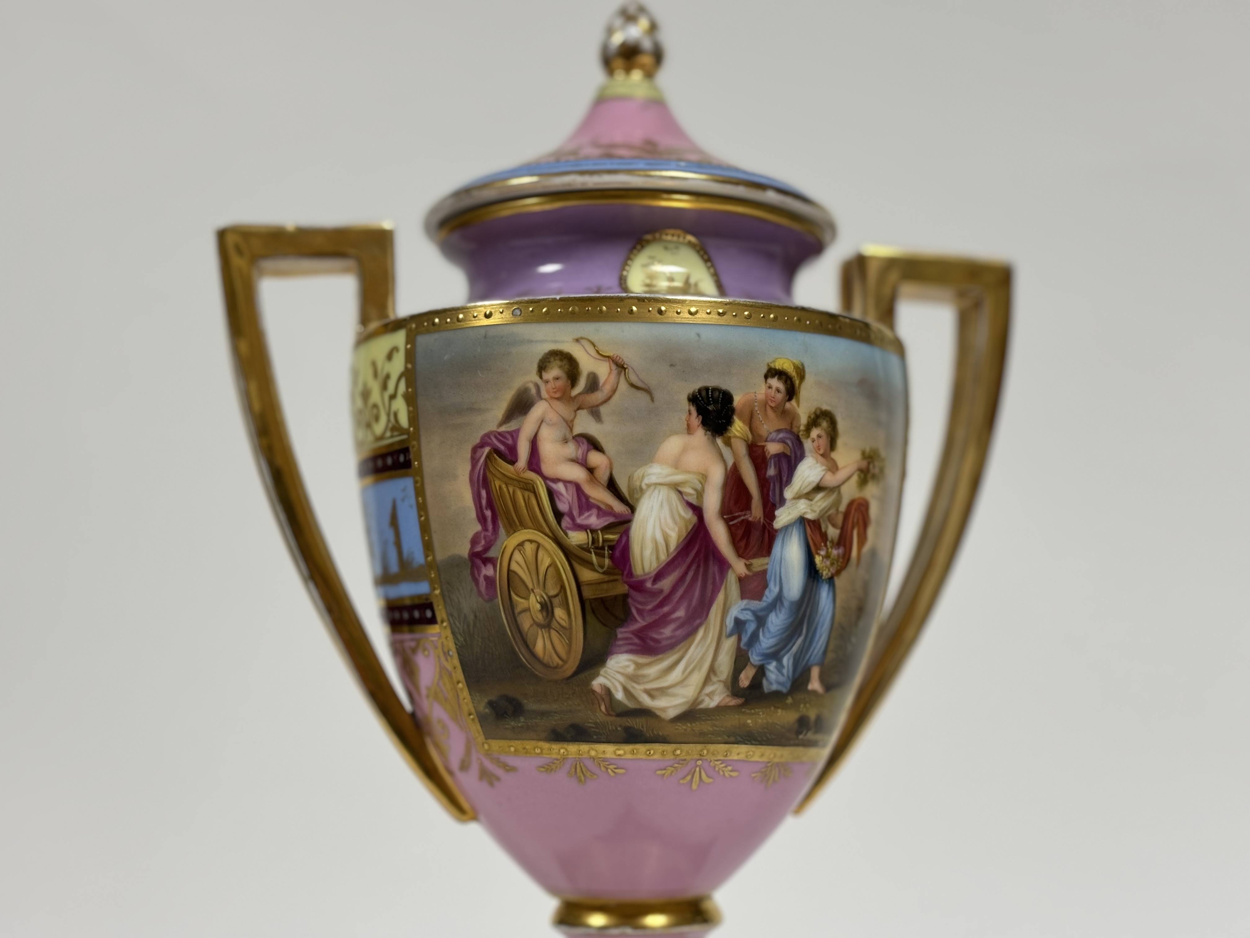 A late 19th century Vienna porcelain covered urn on stand, of hipped baluster form, painted with a - Image 2 of 8