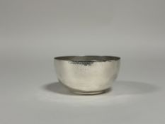 A George V silver bowl, Atkin Brothers, Sheffield 1914, of simple form with planished finish.