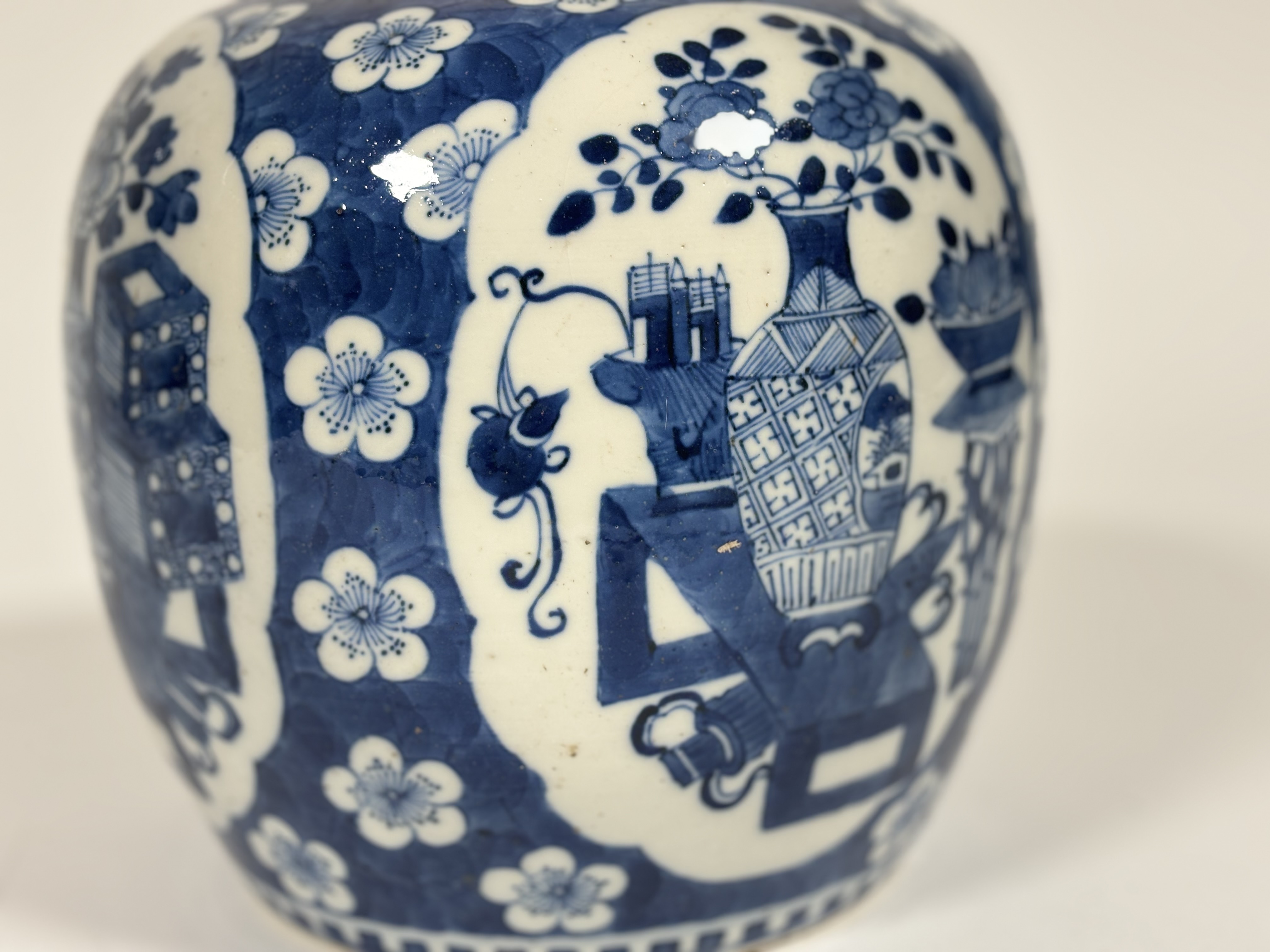 A Chinese blue and white porcelain ovoid jar, probably Kangxi period, painted with shaped cartouches - Image 2 of 6