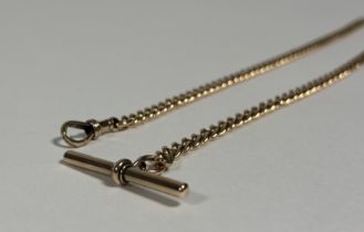 A gold curblink Albert watch chain, with t-bar and lobster clasp, the clasp stamped 9ct, some