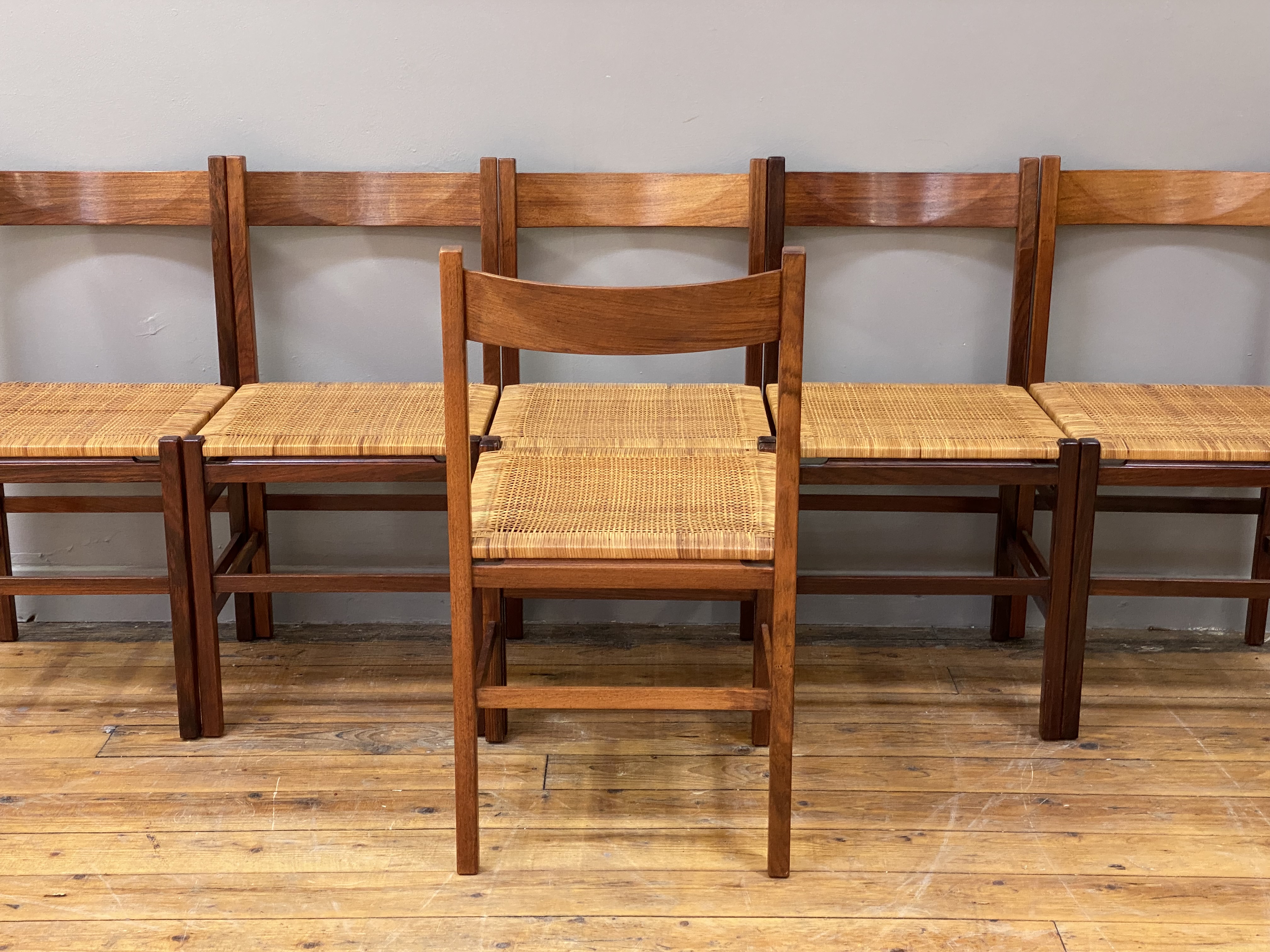 A set of six Danish rosewood dining chairs, circa 1960's, the curved and shaped crest rail above a - Image 4 of 4