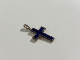 A diamond-set blue enamel cross pendant, early 20th century, the engine-turned enamel within a