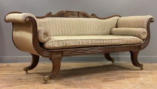 A Regency mahogany framed scroll arm sofa in the manner of William Trotter, the scrolling crest rail