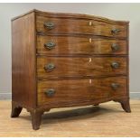 A George III mahogany chest of serpentine outline, the top with boxwood-strung edge above four