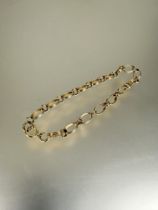 A 9ct gold oval link bracelet with ring clip fastening D 8.5cm 5.7g