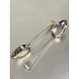 A pair of George III Newcastle silver Old English pattern table spoons with engraved initial M  no