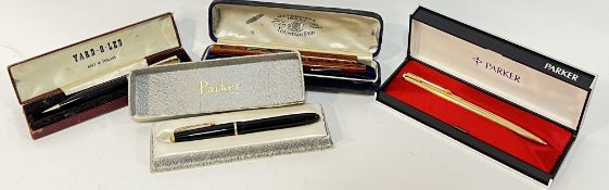 A group of vintage pens comprising a 14ct gold tipped Parker pen, two Waterman pens, a Yard O lead