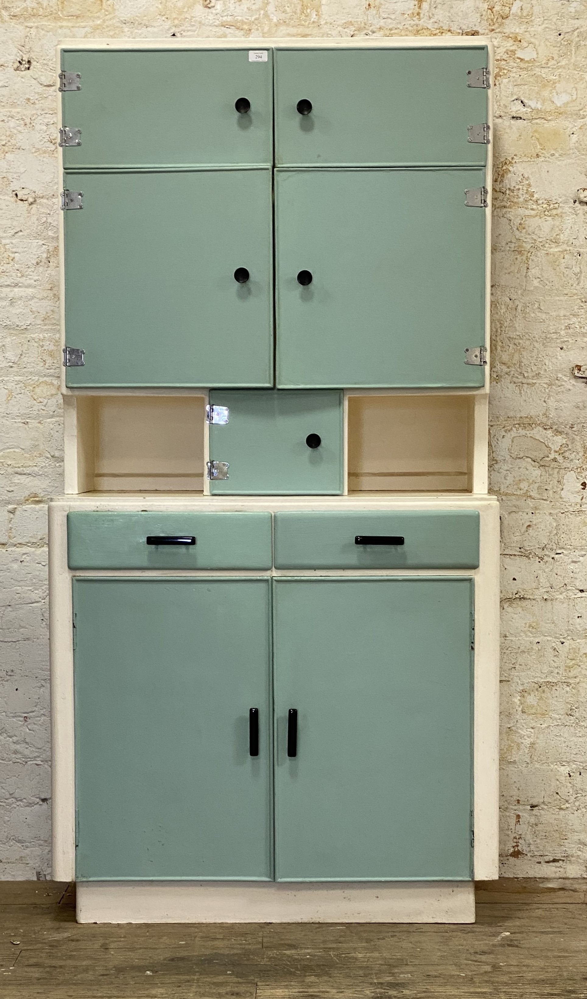 A 1950's blue and white painted kitchen cabinet, fitted with a combination of cupboards and drawers.