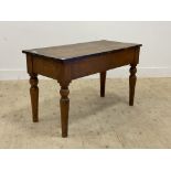 A 19th century mahogany side table, the rectangular top raised on turned supports. (reduced)