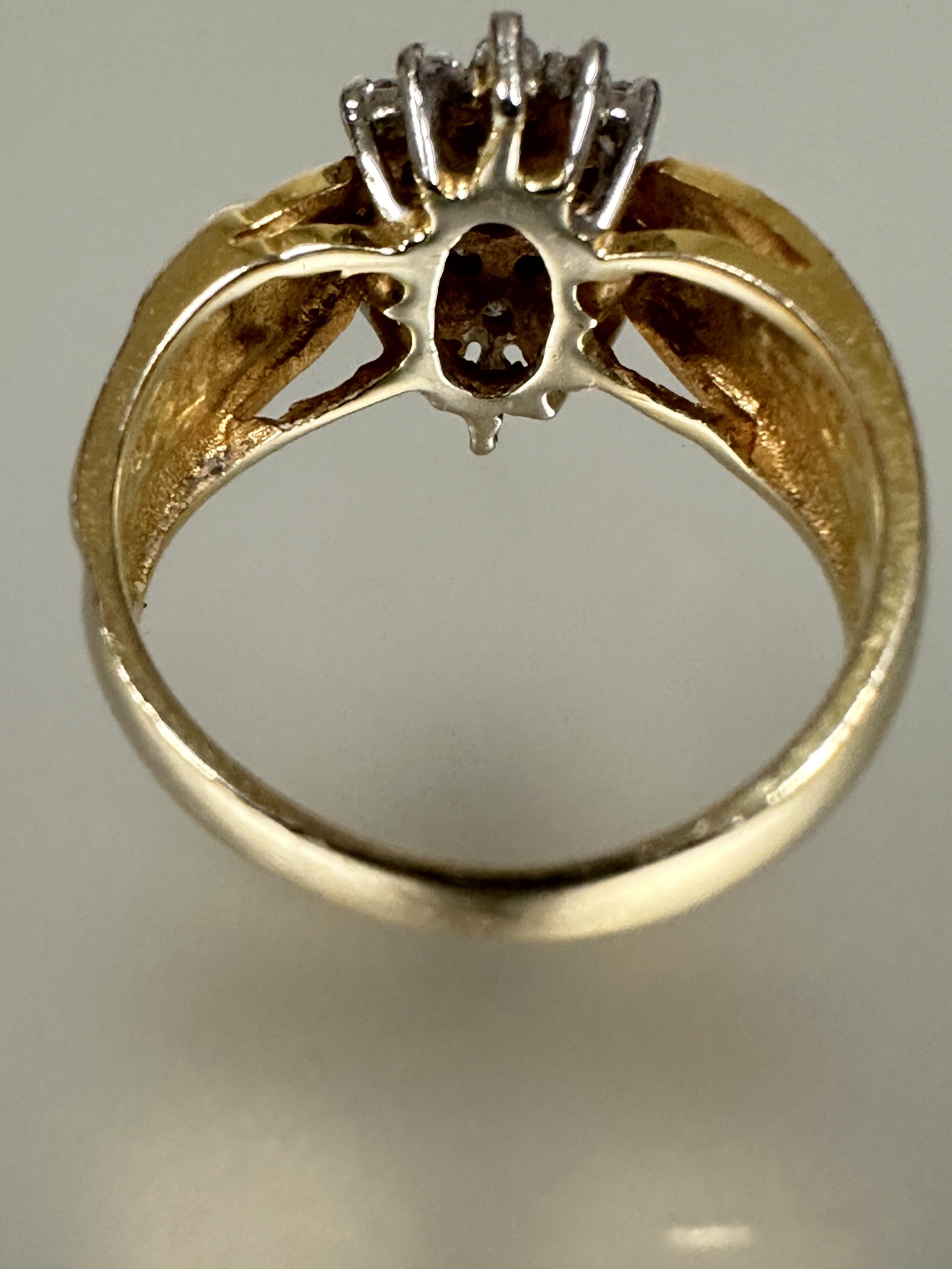 A 14ct gold diamond cluster ring the center brilliant cut stone 0.15ct  within a surround of - Image 4 of 5
